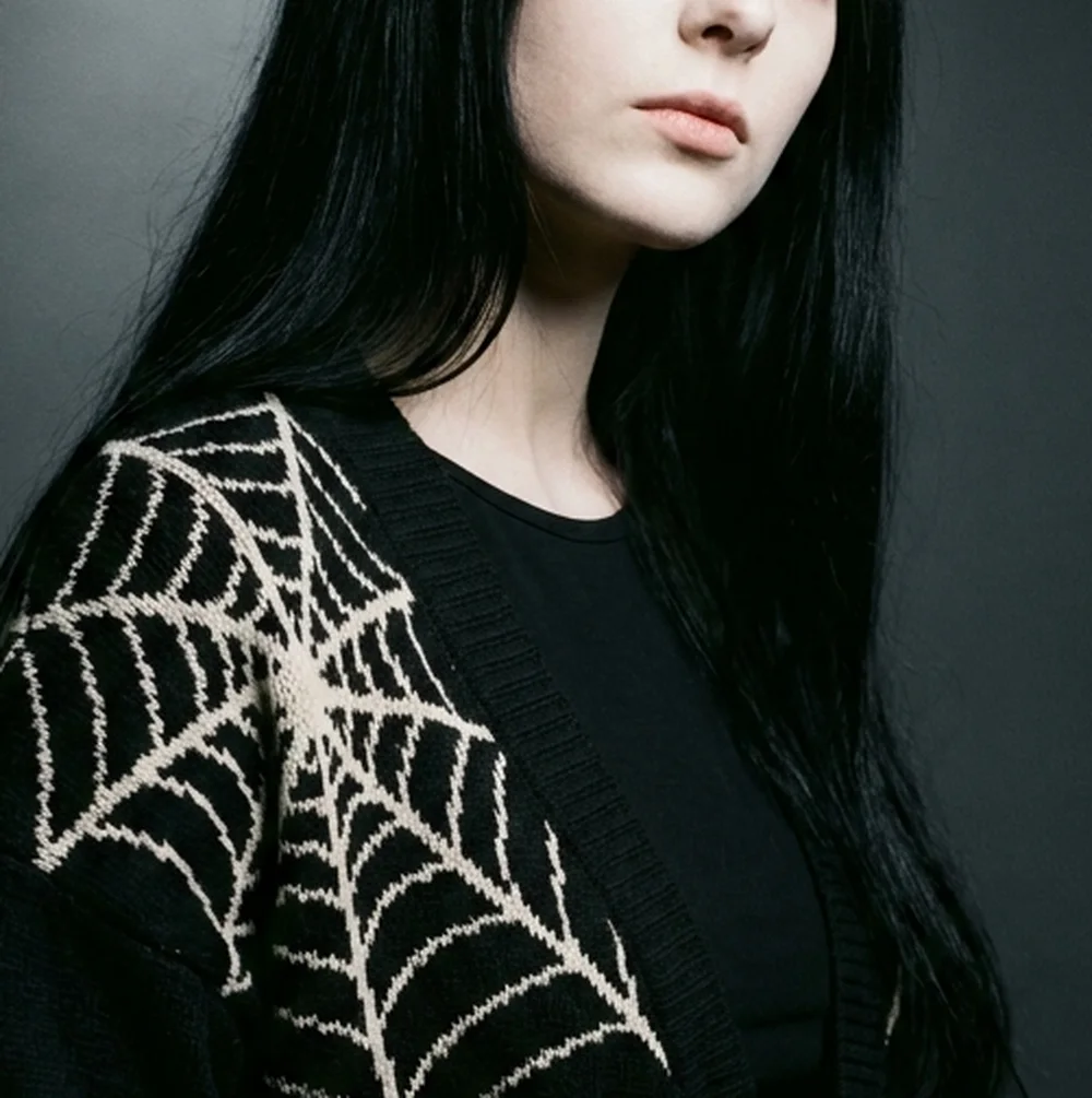Cobweb Cardigan — close-up of the knitted jacquard motif